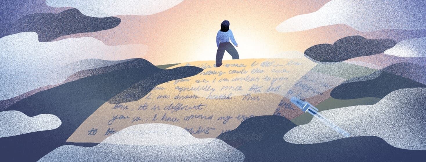 A woman walks confidently over her written letter into the sunrise.